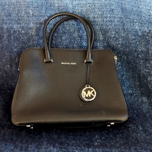 Michael Kors black purse, three compartments, crossbody or shoulder. Hardly used